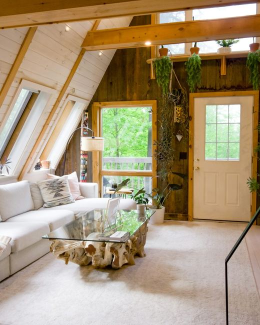 The loft under the skylights, door onto the deck