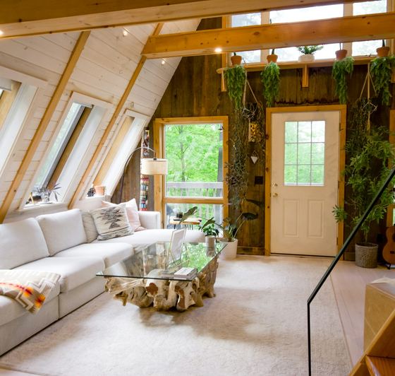 The loft under the skylights, door onto the deck