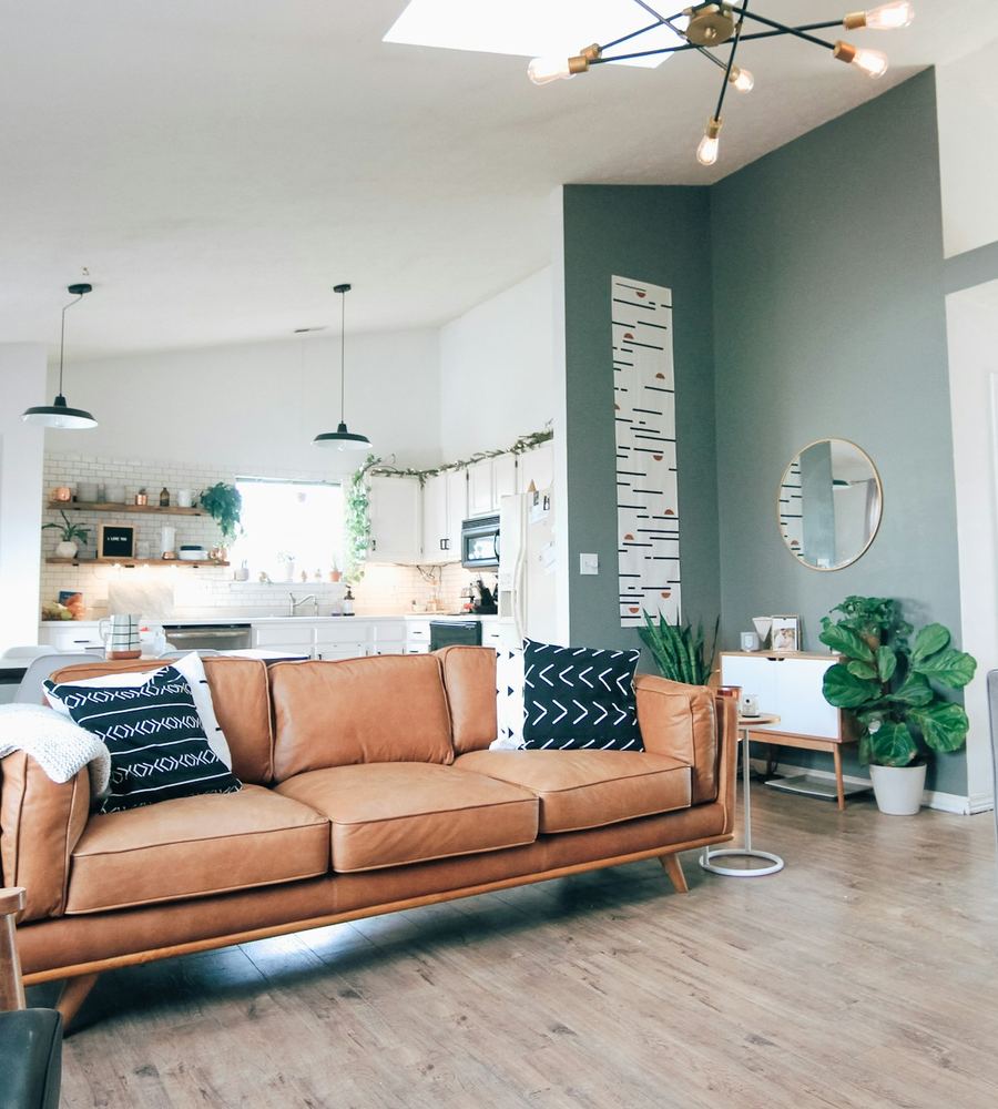A host's own living room, open to the kitchen